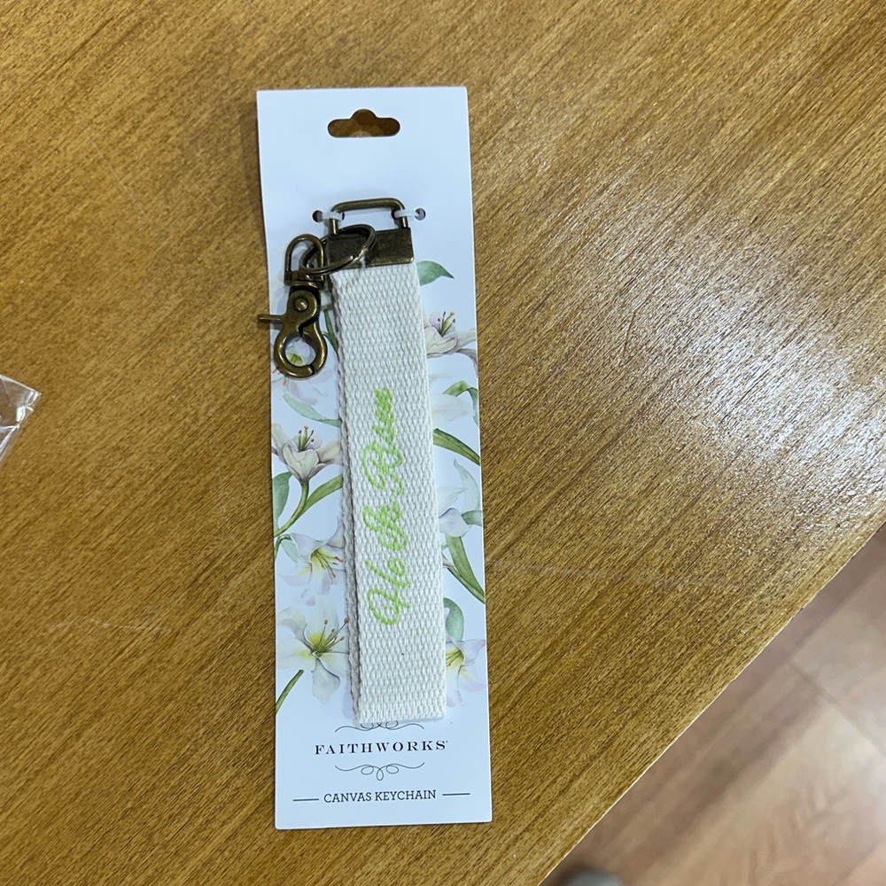 Source Unknown White and Green Canvas Keychain